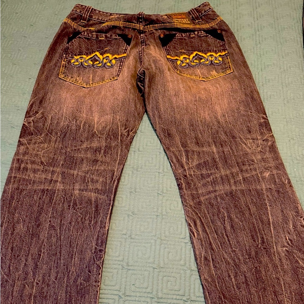 Crown Holder jeans, size 36, Blue jeans with multiple colors on back pockets